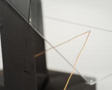 "Black [Assimilated Framing]" (Detail), 2021, acrylic sheet, clear cord, embroidery floss, cardboard frame, wood base, 10 x 5 x 7"