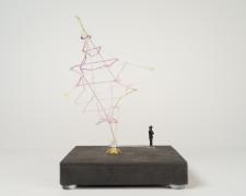 "Black [A Chosen Path]" (View 1), 2021, embroidery floss, clock mechanism, miniature figurine, wood base, 4 x 4 x 6.5"