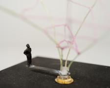 "Black [A Chosen Path]" (Detail), 2021, embroidery floss, clock mechanism, miniature figurine, wood base, 4 x 4 x 6.5"