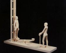 Two Men with Bell, 1996, wood, 33 x 5 x 20 1/2"