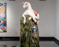 "Los Tesoros De Mi Abuelito", 2020, needle felted wool and poly fiber, glass eyes, polymer clay, glass beads, polyester textile, rug hooked imagery and landscape, 72 x 40 x 29"