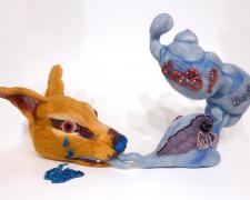 "Song of The Dog", 2022, needle-felted soft sculpture with embroidery, embellishment, and glass beads, 12 x 16 x 7"