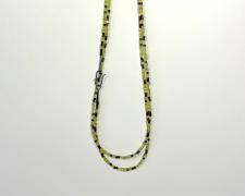 Heidi Gerstacker, "Autumnal Necklace", 2025, sterling silver, hand-forged clasp and end caps, Peridot, Miyuki glass beads, 48" length