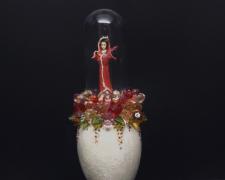 "Berried", 2024, egg, mixed media, 7 x 2 1/2 x 2 1/2"
