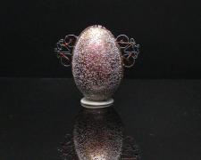 "Bicycle Rally", 2022, egg, mixed media, 3 x 3 1/2 x 2"