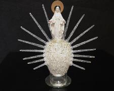 "Mourning Star", 2024, egg, mixed media, 7 x 7 x 2 1/2"