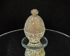 "Regalia", 2024, egg, mixed media, 2 1/2 x 2 x 2"