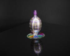 "Tartan", 2022, egg, mixed media, 3 1/2 x 2 1/2 x 2 1/2"