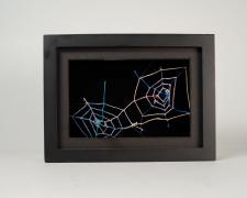 "Black [Underneath The Surface]" (View 1), 2021, embroidery floss, clear cord, matted wood frame, 8 x 3.5 x 6"