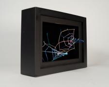 "Black [Underneath The Surface]" (View 2), 2021, embroidery floss, clear cord, matted wood frame, 8 x 3.5 x 6"