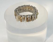 Edward Lane McCartney, "Book of Hours, Devotionals on Silver and Gold", 2023, ring: fabricated sterling, 22k, 18k, and 14k yellow gold; made up of 225 individual components