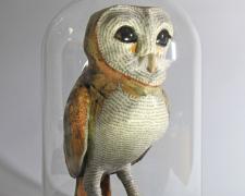 "Barn Owl", 2023, foil, wire, papier-mâché, wood, 12 x 8 x 8"
