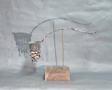 "Any Ladle's Sweet That Dishes Out Some Gravy", 2025, appropriated and manipulated vintage silver plate ladle, stainless steel, pearls, faux pearls, various semi-precious stones and beads, walnut, brass, 12 1/2 x 16 1/2 x 6"