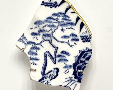 "Breaking Bread III", 2026, brooch: porcelain, sterling, 3 1/2 x 2 3/4 x 1/2"