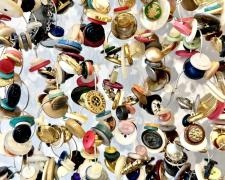 "Button (detail)", 2025, wall hanging assemblage: nickel, vintage sewing buttons, aluminum, 48 x 60 x 5"