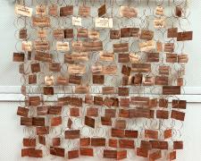"Dirty Words", 2025, wall hanging assemblage: copper, bronze, brass, 22 x 22 x 2"