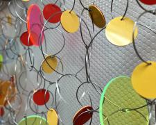 "Effervescence" (detail), 2025, wall hanging assemblage: nickel, acrylic, plastic, aluminum, 66 x 45 x 4"