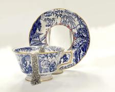 "Elixir II" (view 1), 2026, bangle cup and saucer: porcelain, sterling, tin, stainless steel, cup: 2 1/2 x 5 x 4"; saucer: 5 3/4 x 5 3/4 x 1"