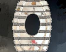 "Heirloom Impotence, Armor", 2026, necklace: silverplate serving tray, stainless steel, 34 x 19 x 1 1/4"