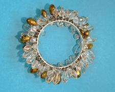 Edward Lane McCartney, "I Wanna Hang from the Chandelier", 2025, bangle bracelet: sterling, brass, crystal