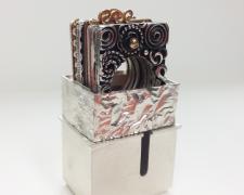 Jewelry Box #4, 2017, set of ten stacking rings, sterling, reticulation silver, 14k yellow gold, ebony, mokume game, brass, 1 1/4 x 1 x 1 5/8"