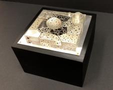 Jewelry Box #9, Aerial Landscape, 2019, 12 puzzle rings, wood, aluminum, fabricated sterling, 6 x 6 x 5"