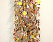 "Measured", 2021, wall mobile: brass, aluminum, bronze, found objects, 44 x 16 x 4"