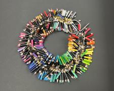 "Pencillation IV", 2026, necklace: colored drawing pencils, stainless steel, brass, 33 x 5 x 3 1/2"