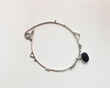 Perimeter #3, 2018, bangle bracelet: sterling, fine silver, hematite, 3 1/4 x 2 1/2 x 1/4"