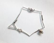 Perimeter #6, 2018, bangle bracelet: sterling, bronze, lemon quartz, 4 x 3 7/8 x 1/4"