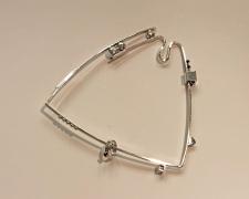 Edward Lane McCartney, "Perimeter #7", 2020, sterling, fine silver, 14k yellow gold, rhodolite garnet, 3 1/2 x 3 1/2 x 3/8"