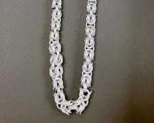 "Scale, Byzantine (view 1)", 2026, necklace: aluminum, 66 x 6 x 1 1/4"