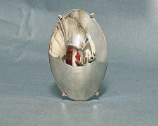 "Tumescence", 2025, brooch: silver plate ladle bottom, nickel, sterling, stainless steel, 4 x 2 1/2 x 1 1/4"