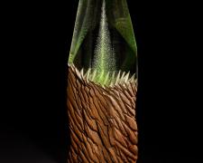 Emerald Spark, cast and cut glass, fused steel, 23 x 6 x 3"