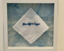 "En Algún Lugar", 2024, embroidery, handkerchief, micron markers, Mylar, 12 x 12"