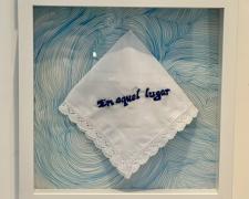 "En Aquel Lugar", 2024, embroidery, handkerchief, micron markers, Mylar, 12 x 12"