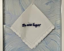 "En Este Lugar", 2024, embroidery, handkerchief, micron markers, Mylar, 12 x 12"
