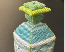 Heather Logan, "Lacy", 2025, beadwork, 3 1/2 x 1 1/2 x 1 1/2"