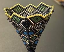 Heather Logan, "Lost and Found", 2025, beadwork, 4 3/4 x 2 x 2"