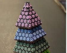 Heather Logan, "Stacking Tree", 2025, beadwork, 5 1/2 x 3 1/2 x 3 1/2"