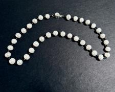 Victor Beckmann, "When U Smiley", 2025, freshwater pearls, sterling silver, silk, 9 x 1 x 1/4"
