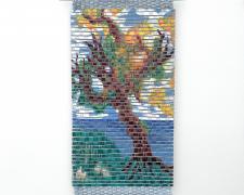 "The Rages: Wailing Tree", 2025, handwoven drawings on basswood with acrylic, ink, and colored pencil woven with cotton and metallic thread, 12 x 8"