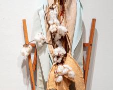 "Layered Existence", 2023, mixed media: intaglio, vintage wood ironing board, plantation cotton, 42 x 13 x 1 1/2"