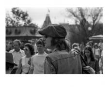 May Pang, "A Face in the Crowd, Disney World, FL 1974", archival pigment print, 16 x 20", listed edition of 199