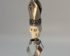 Edward Lane McCartney, "Memento Mori III, Infallibility", 2023, stickpin: fabricated sterling, carved bison bone, 14k and 10k yellow gold, CZs