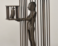 "Caged Man with Caged Bird", 1987, bronze, 9 x 3 3/4 x 6", AP edition of 10