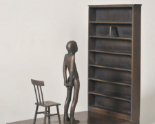 "Man Looking at Book", 1997, bronze, 12 3/4 x 7 x 12", edition 3 of 9