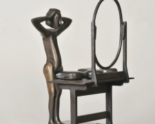 "Man Trying on Heads", 1991, bronze, 10 7/8 x 7 x 7 7/8", edition 6 of 10