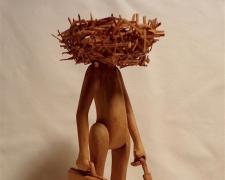 Man with Head in Nest (Small), 1980, pine wood, 9 1/4 x 3 1/2 x 3 1/2"