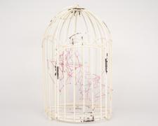 "Caged No. 1" (View 1), 2021, embroidery floss, clear cord, metal bird cage, 6 x 5 x 10.5"